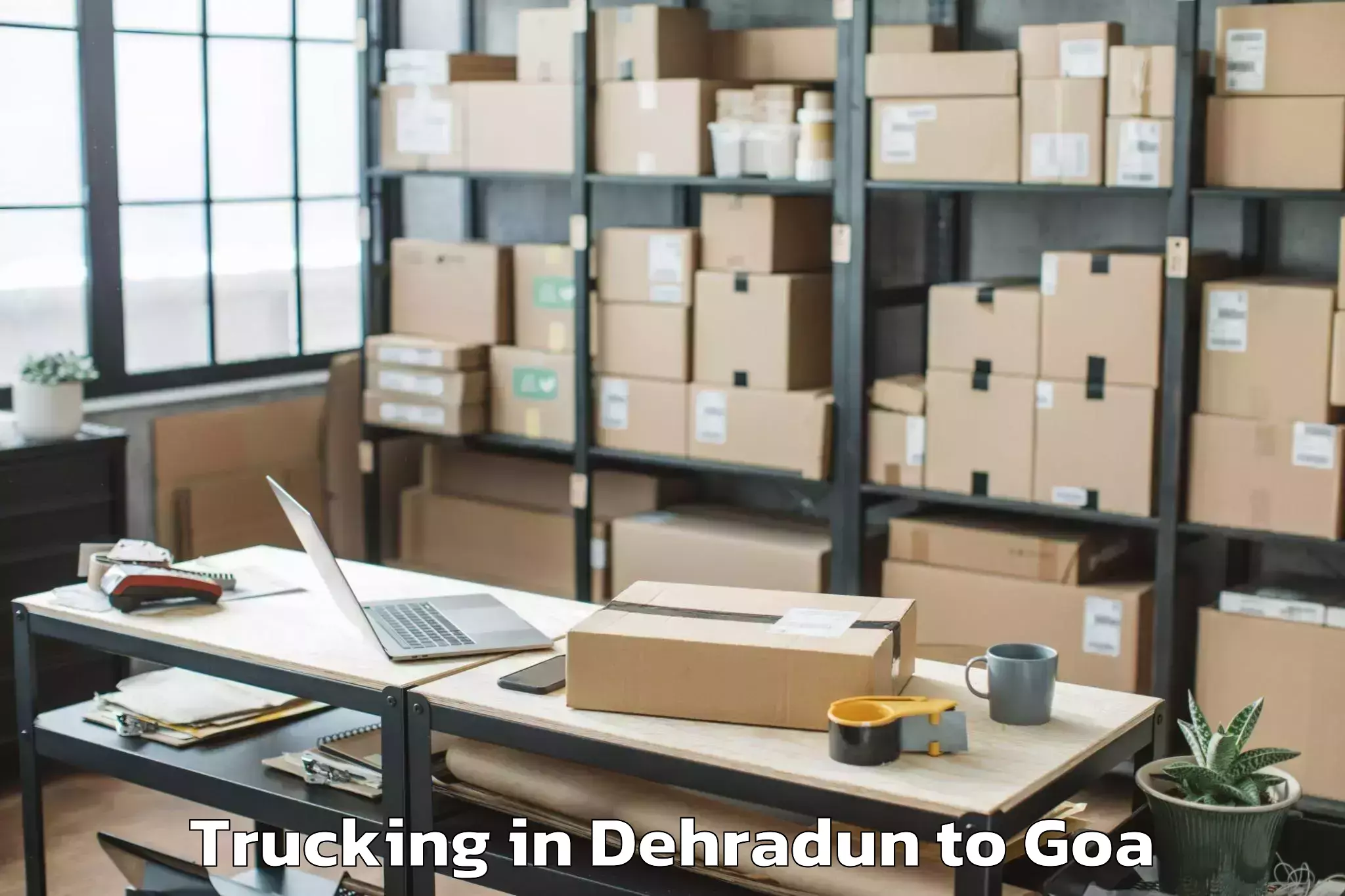 Affordable Dehradun to Mopa Trucking